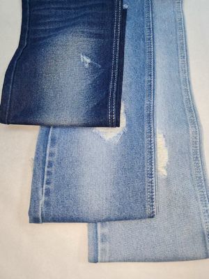 satın al 11.4oz Ağır Gramajlı Pamuk Polyester KOYU İNDİGO Denim Kumaş 10+10*7 Yapı JSD3243 kot pantolon için online manufacture